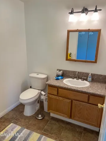 a bathroom with a sink and a toilet