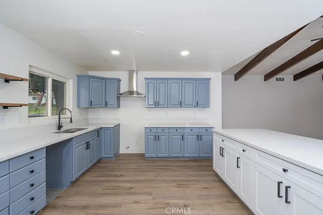 a large kitchen with cabinets