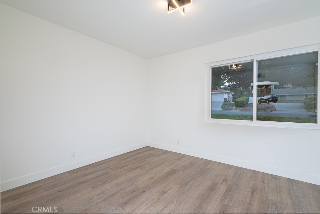6026 Moraga Avenue Riverside, CA 92509 - Photo 16 of 42 an empty room with a window