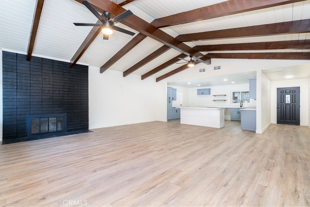 6026 Moraga Avenue Riverside, CA 92509 - Photo 2 of 42 a view of empty room with wooden floor