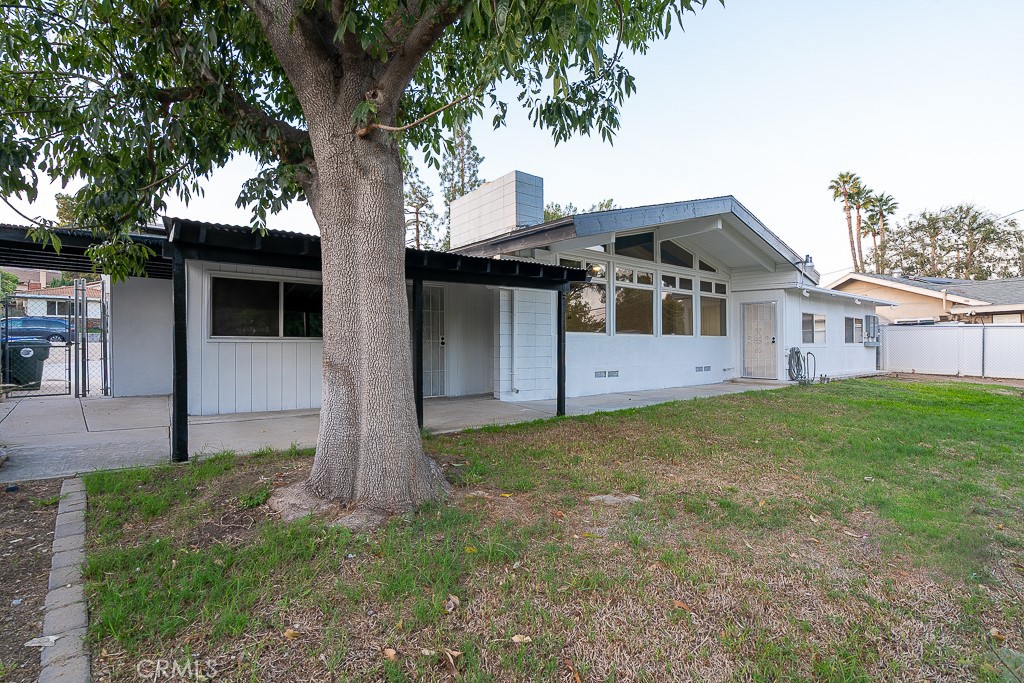 6026 Moraga Avenue Riverside, CA 92509 - Photo 32 of 42 a front view of house with yard and entertaining space