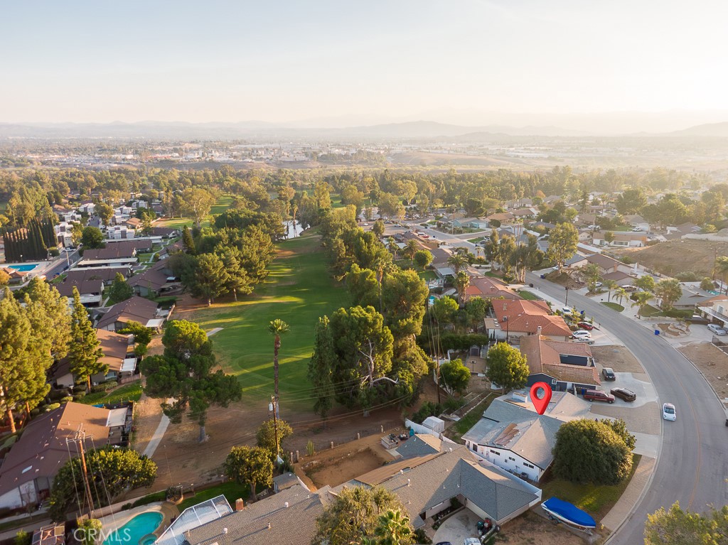 6026 Moraga Avenue Riverside, CA 92509 - Photo 35 of 42 an aerial view of a city with lots of residential buildings
