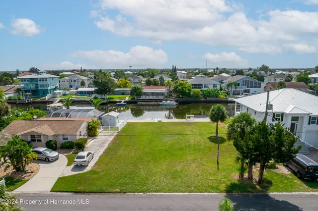 a view of a lake with a city