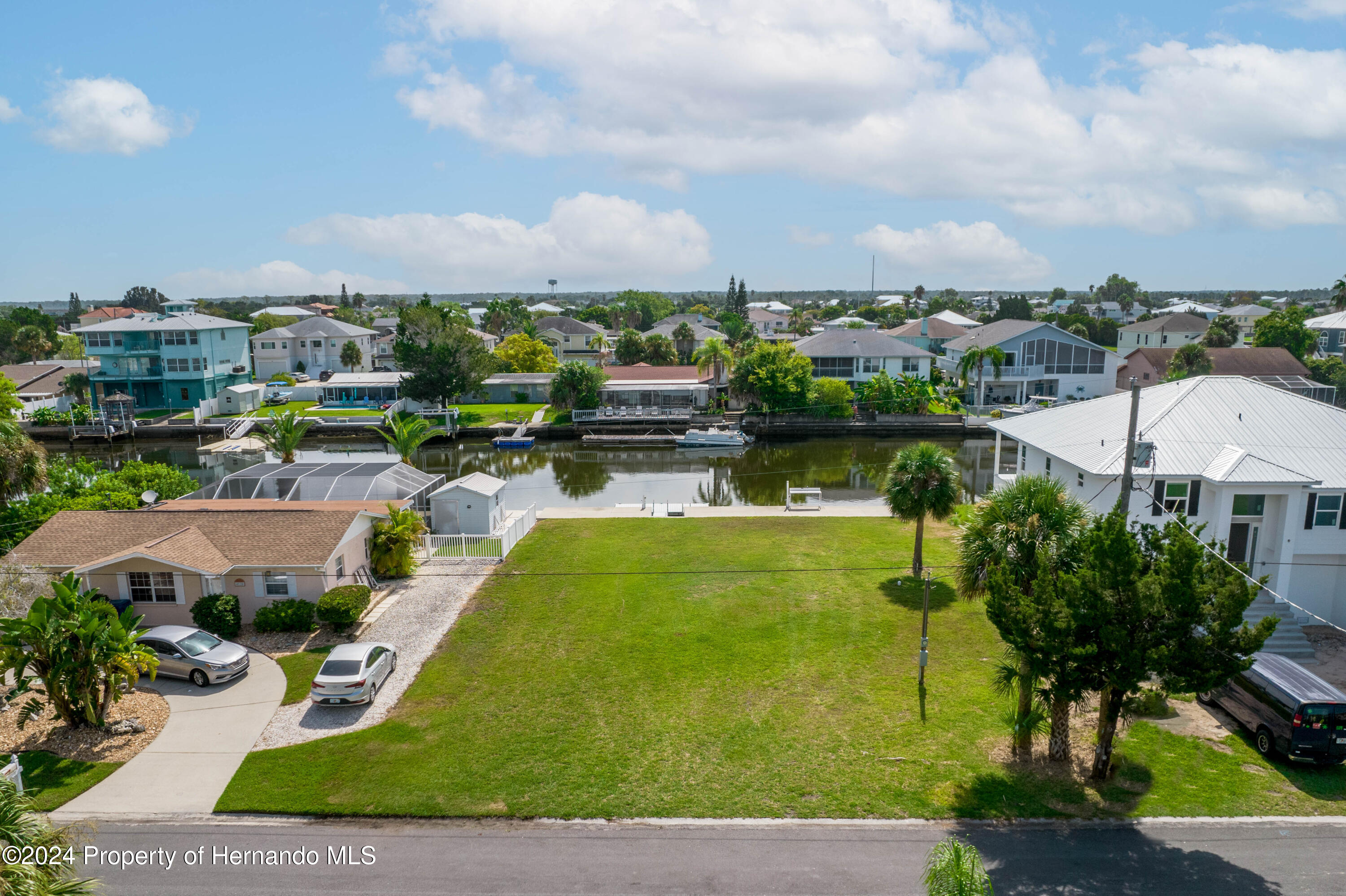 4530 Gulfstream Weeki Wachee, FL 34607 - Photo 5 of 22 a view of a lake with a city