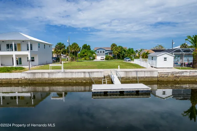 a swimming pool with barbeque oven