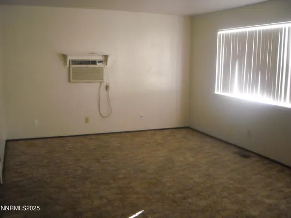 a kitchen with a sink and a refrigerator