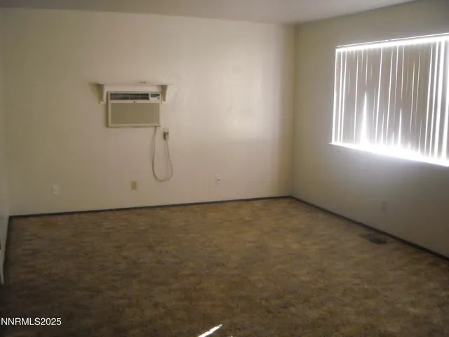 a kitchen with a sink and a refrigerator
