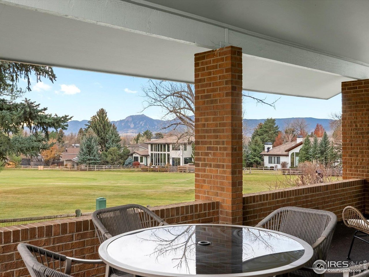 6972 Roaring Fork Trail Boulder, CO 80301 - Photo 22 of 35 a view of a swimming pool with an outdoor seating