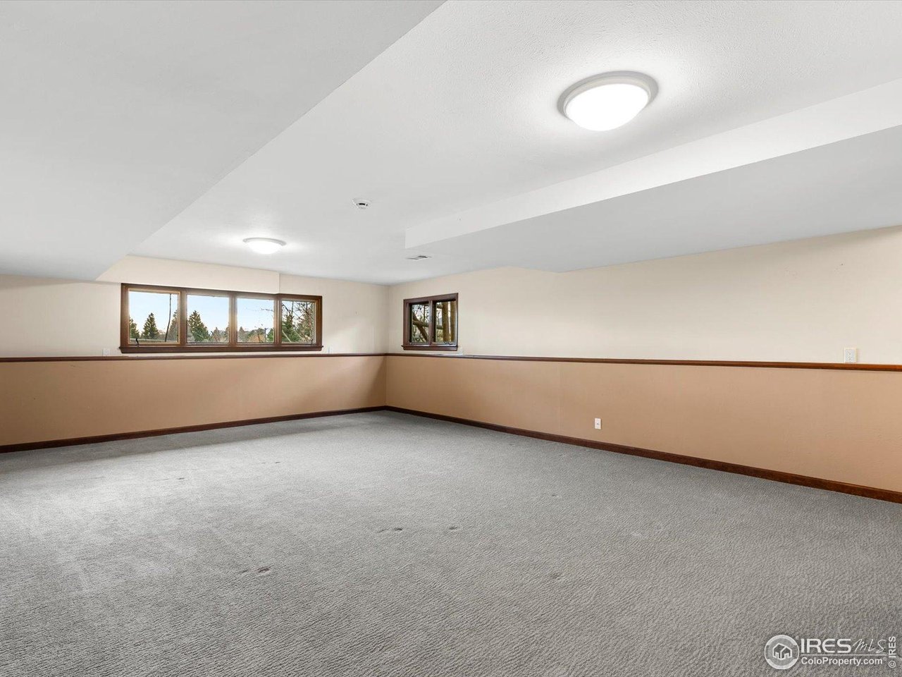 6972 Roaring Fork Trail Boulder, CO 80301 - Photo 25 of 35 a view of an empty room with a window