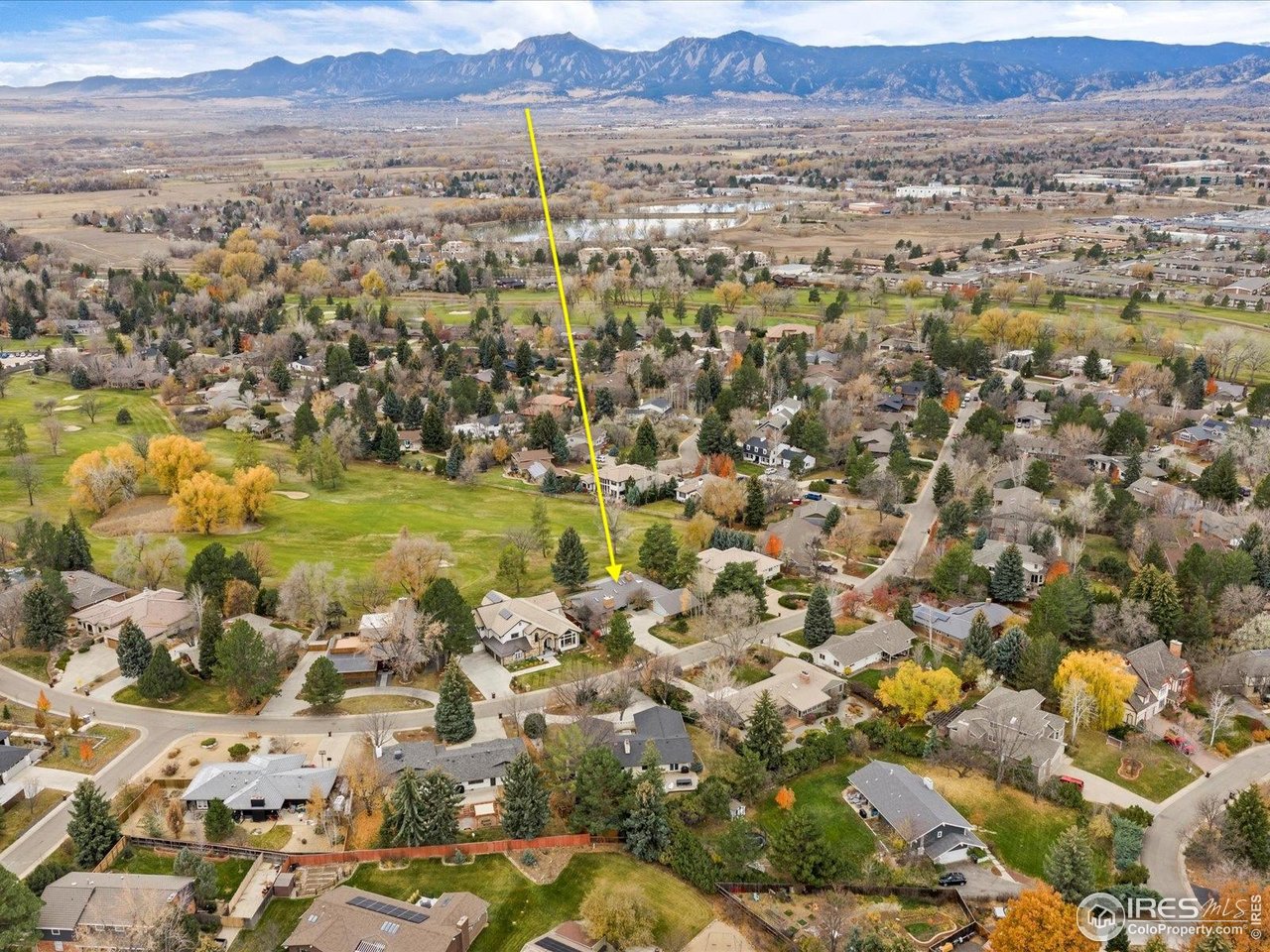 6972 Roaring Fork Trail Boulder, CO 80301 - Photo 34 of 35 an aerial view of residential house with parking and trees