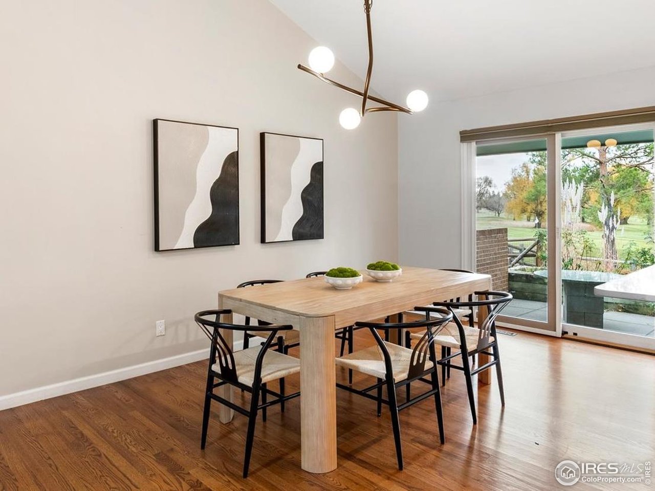 6972 Roaring Fork Trail Boulder, CO 80301 - Photo 7 of 35 a dinning table and chairs in a room