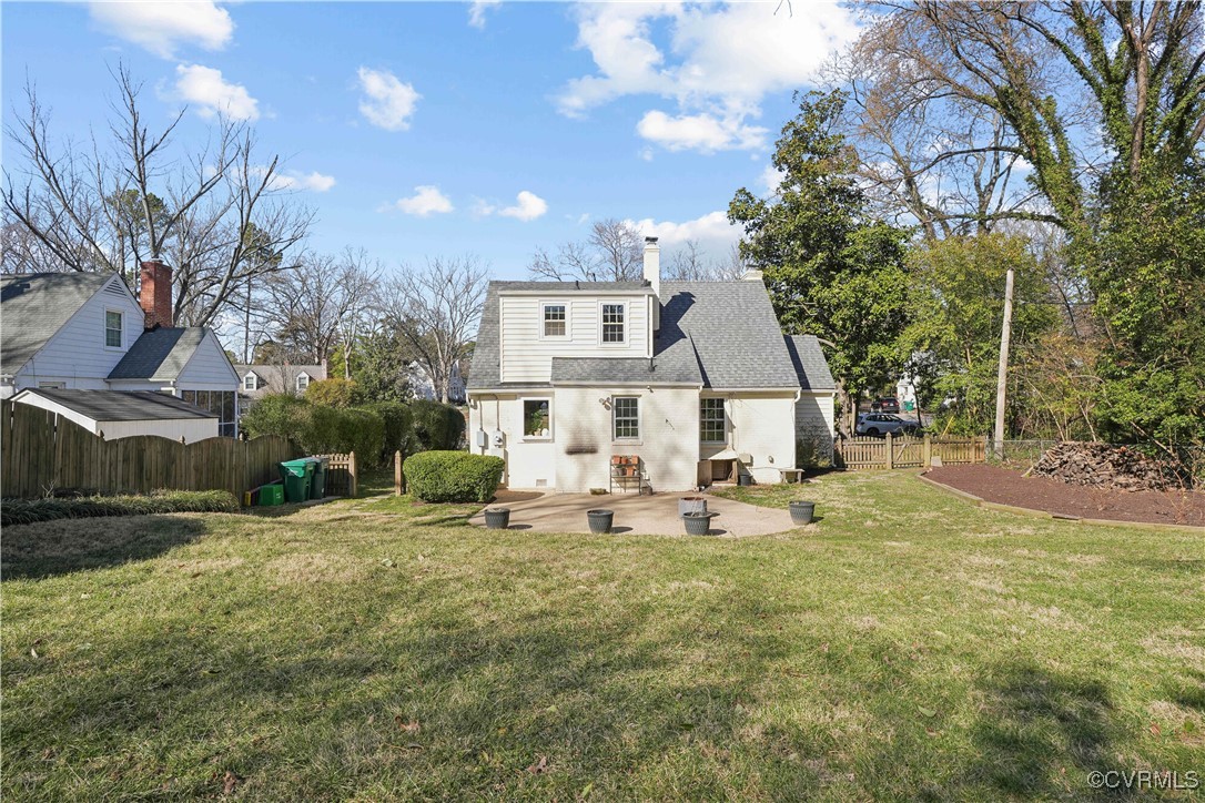 7501 Glebe Road Henrico, VA 23229 - Photo 18 of 19 Rear view of house with roof with shingles, a pati