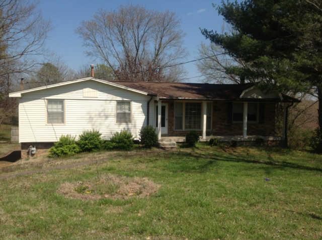 605 Roxanne Court Antioch, TN 37013 - Photo 1 of 1 a front view of a house with a yard and porch
