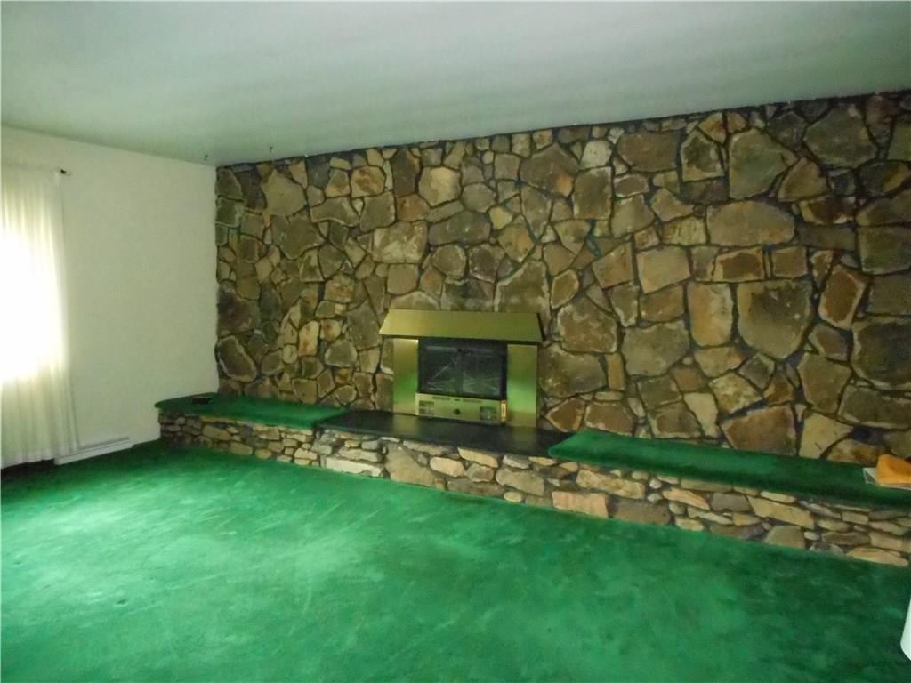7174 Country Club Road Butler, PA 16001 - Photo 5 of 23 One of 2 wood burning fireplaces~This one is in the living room and the other is basement game room