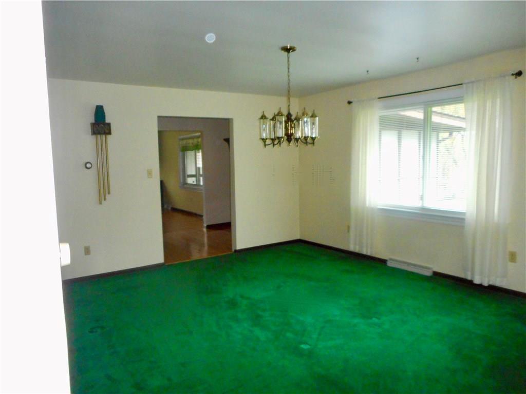7174 Country Club Road Butler, PA 16001 - Photo 6 of 23 Dining room with 2 large windows showcasing the back yard