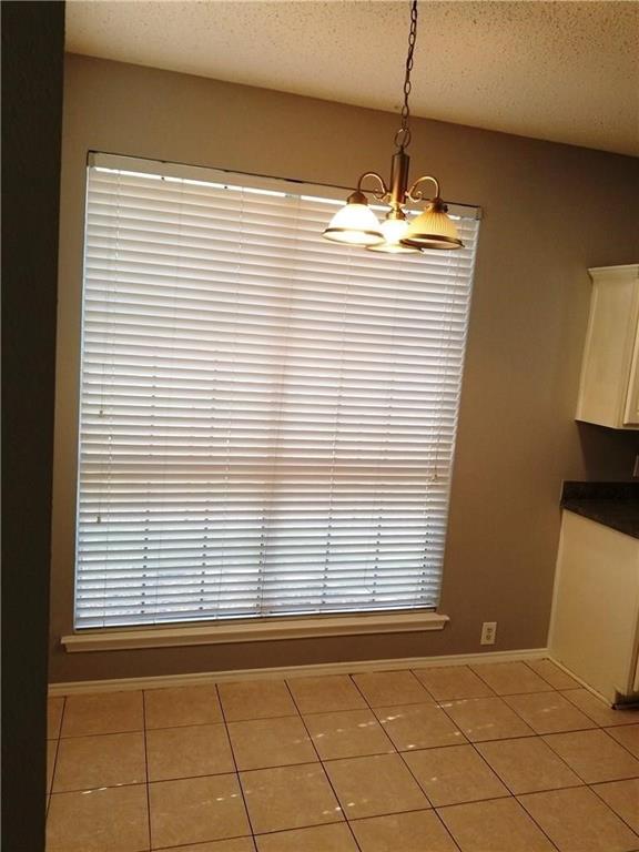 1100 Raleigh Drive Lewisville, TX 75077 - Photo 5 of 19 a view of a room with windows