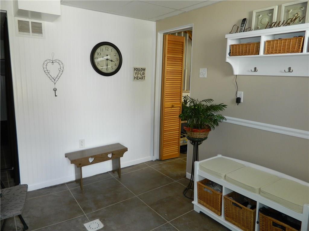 516 Franklin Farms Road Washington, PA 15301 - Photo 22 of 25 The den area is located next to the laundry area.