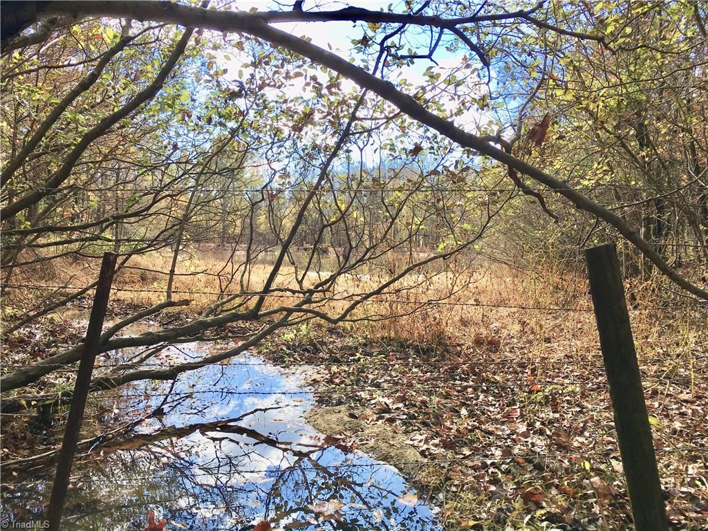 2 Evans Road Mocksville, NC 27028 - Photo 1 of 14 The 5+ Acre (TRACT 2) Has a beautiful building site, perfect for walk out, daylight basement home overlooking tranquil pond in the distance.