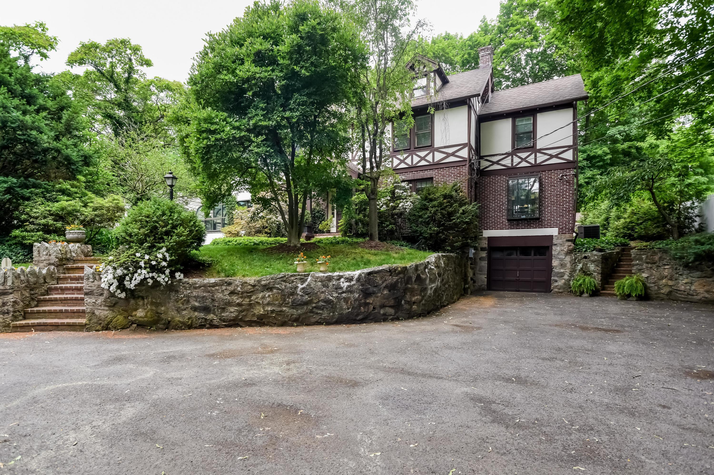 12 Old Post Road Cos Cob, CT 06830 - Photo 27 of 34 a view of a house with a yard and large tree
