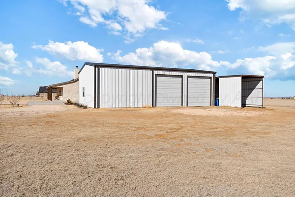 a view of swimming pool with a yard