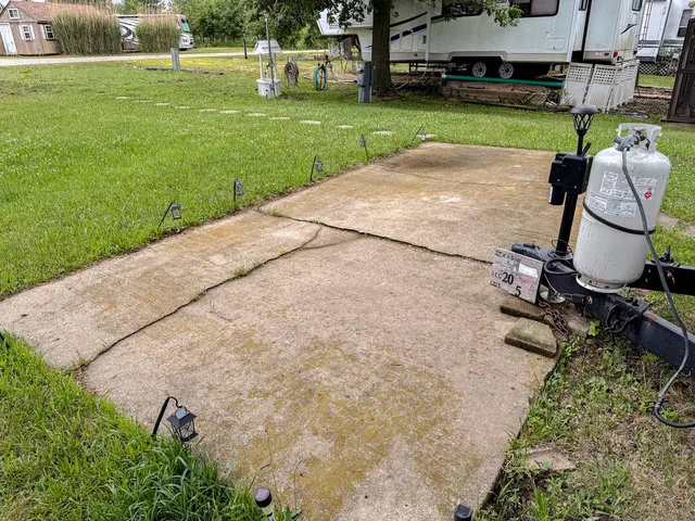 a view of a backyard with sitting area