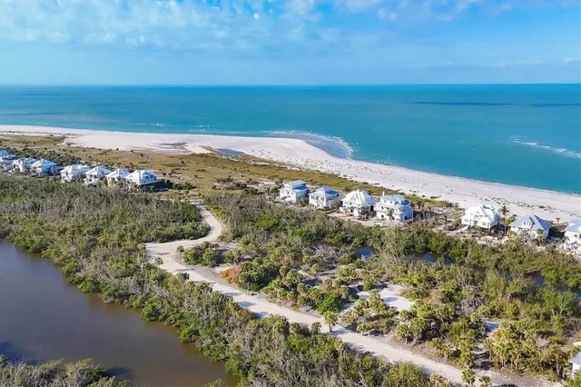 a view of a lake with a yard