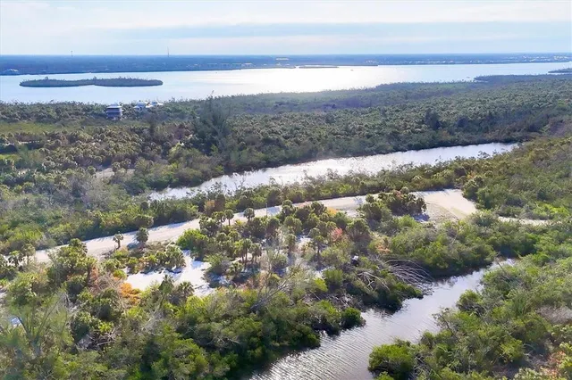 a view of a lake with mountains in the background