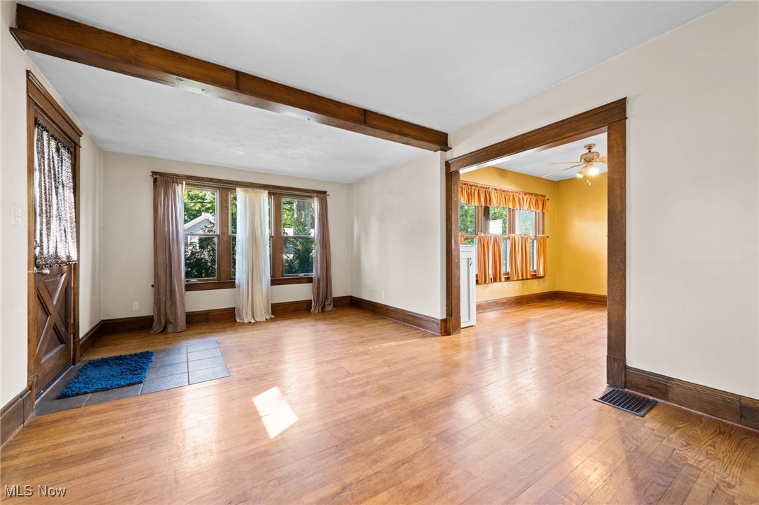 3918 Bluestone Road Cleveland Heights, OH 44121 - Photo 2 of 27 Living room with ceiling beam ,and light hardwood / wood-style flooring