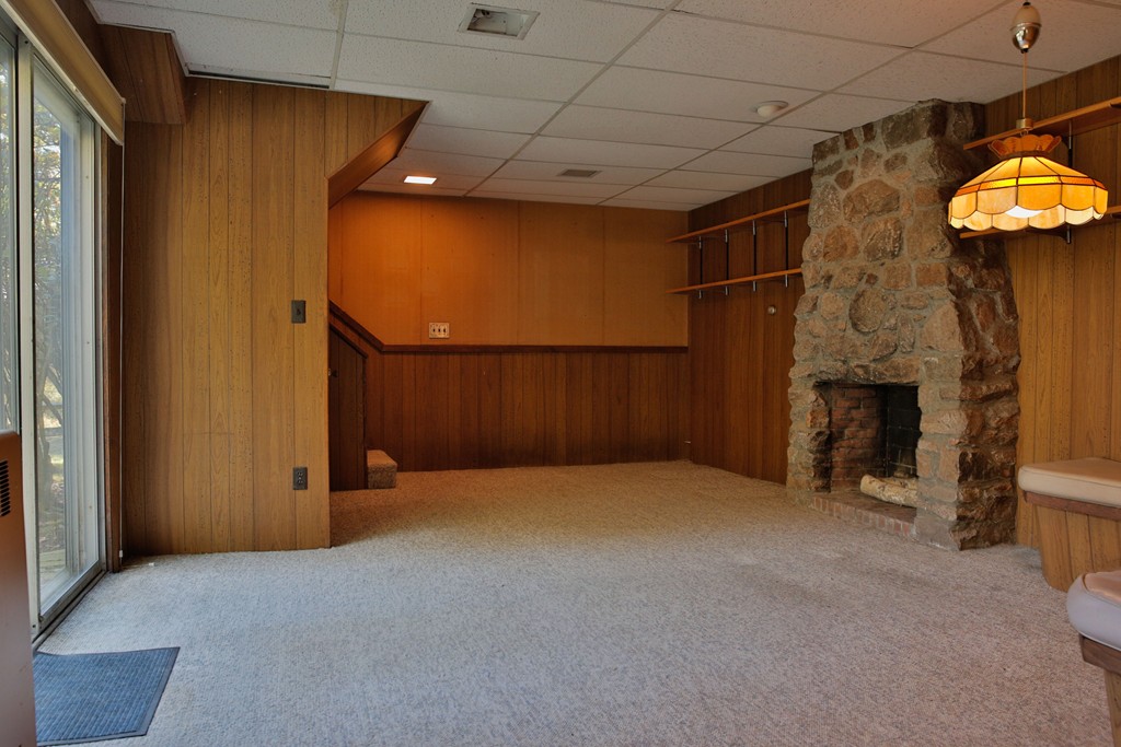 15 Leather Lane Beverly, MA 01915 - Photo 21 of 24 a view of an empty room with a fireplace