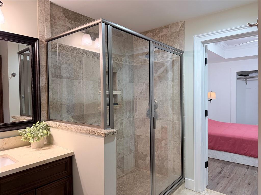 1600 Reddstone Cl Milton, GA 30004 - Photo 78 of 102 a bathroom with a sink and a mirror