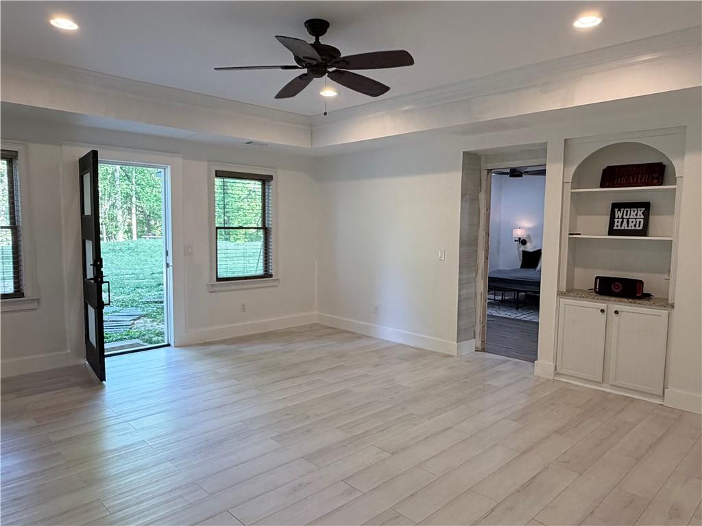 1600 Reddstone Cl Milton, GA 30004 - Photo 88 of 102 a view of a livingroom with a flat screen tv