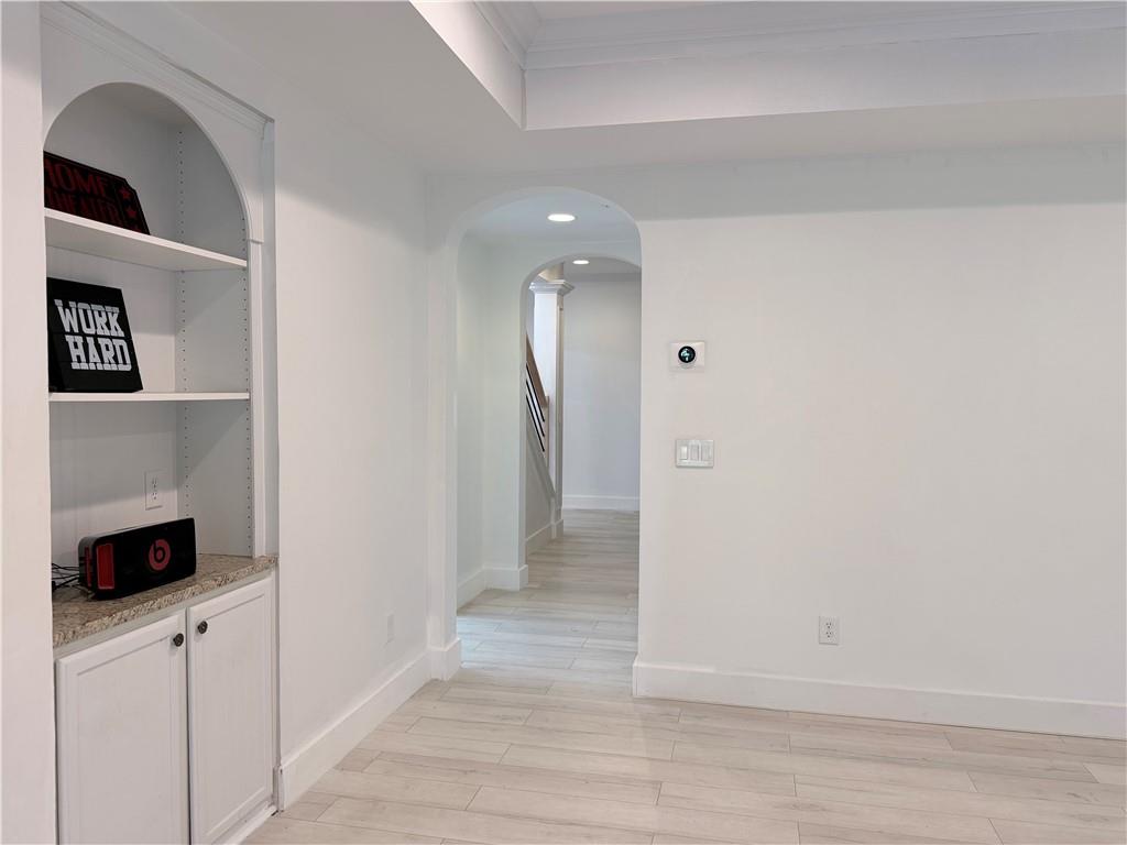 1600 Reddstone Cl Milton, GA 30004 - Photo 92 of 102 a view of an entryway with wooden floor