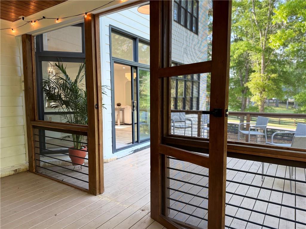 1600 Reddstone Cl Milton, GA 30004 - Photo 99 of 102 a view of a large window with an outdoor space