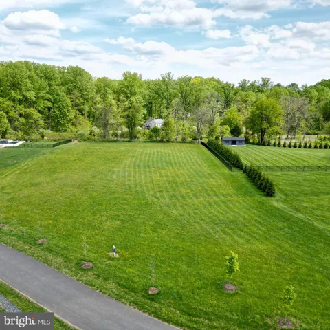a view of a golf course with a lake