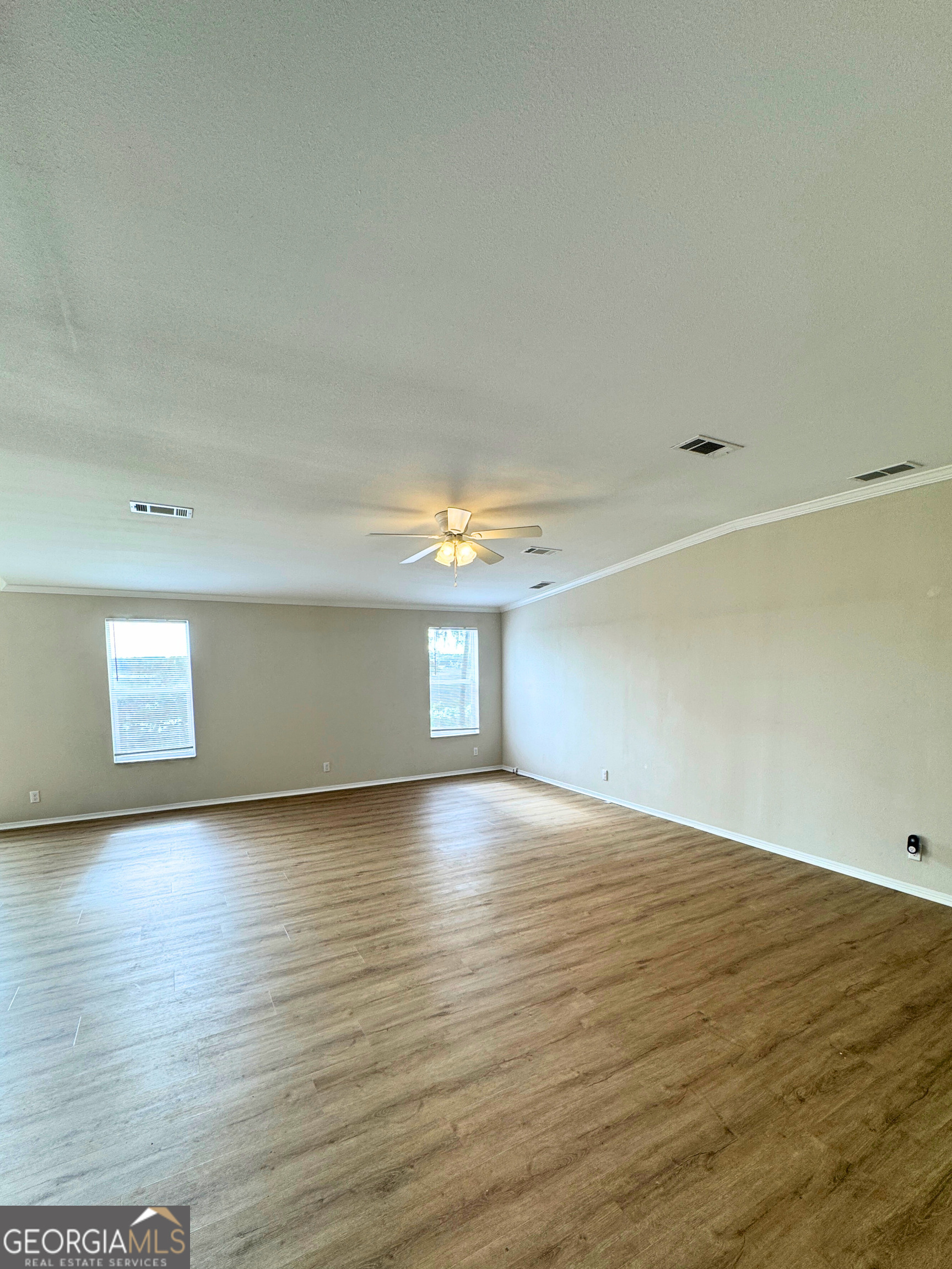 2554 Harrietts Bluff Road Woodbine, GA 31569 - Photo 5 of 35 a view of an empty room and window