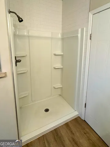 a bathroom with a toilet and a sink