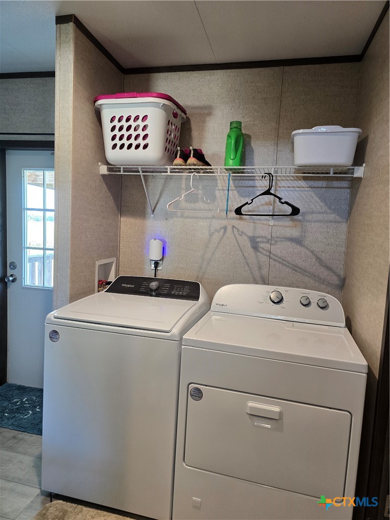 412 Coryell City Road Gatesville, TX 76528 - Photo 25 of 34 a view of storage and utility room with washer and dryer