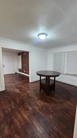 a view of work space with wooden floor