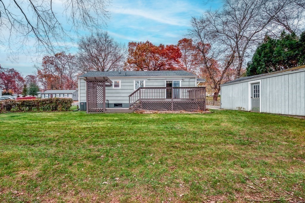 150 Louis Road Springfield, MA 01118 - Photo 24 of 39 a view of a house with a back yard