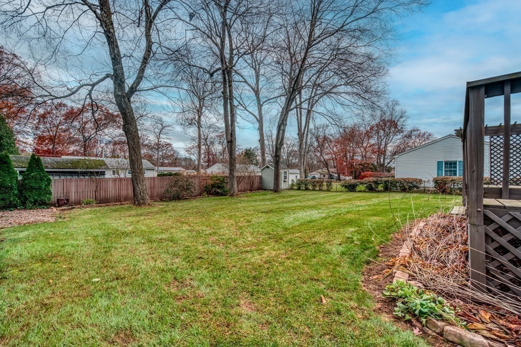 150 Louis Road Springfield, MA 01118 - Photo 27 of 39 a backyard of a house with lots of green space
