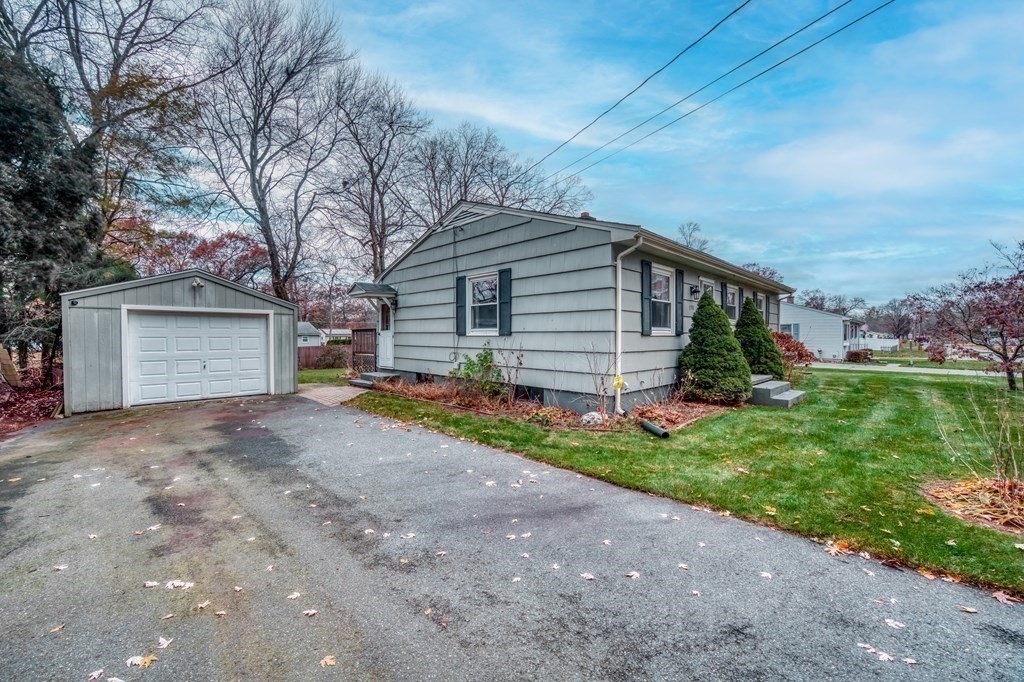 150 Louis Road Springfield, MA 01118 - Photo 31 of 39 a view of a house with a yard