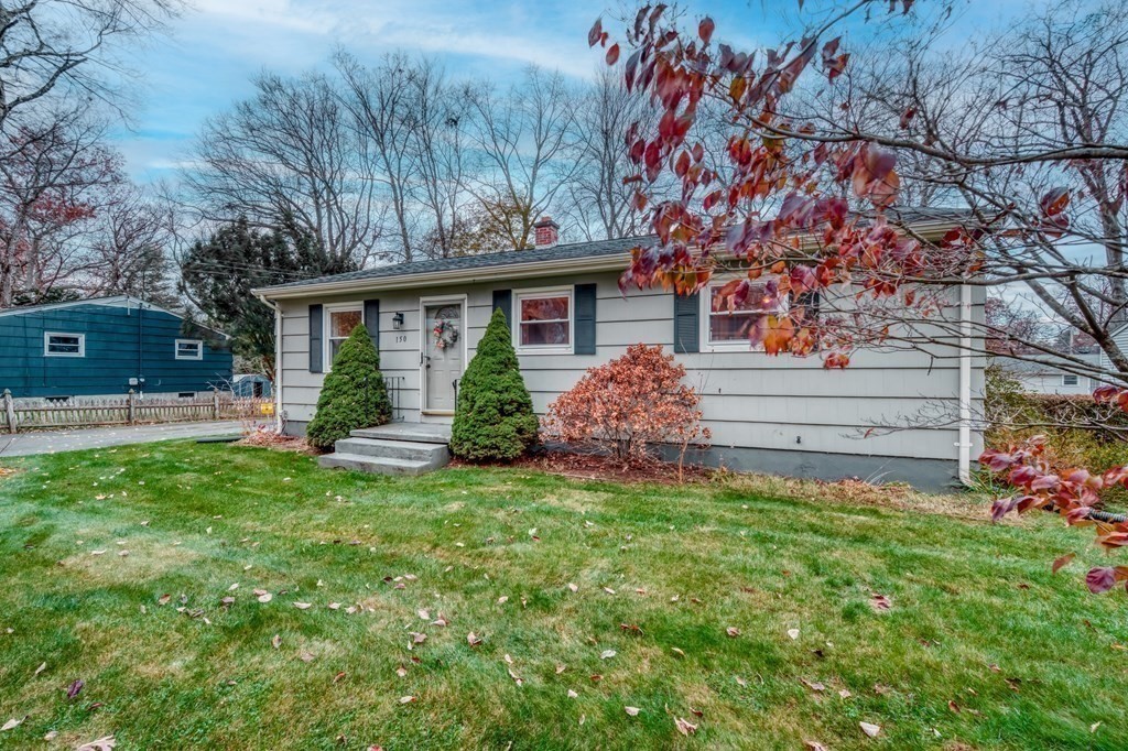 150 Louis Road Springfield, MA 01118 - Photo 35 of 39 a front view of house with yard and green space
