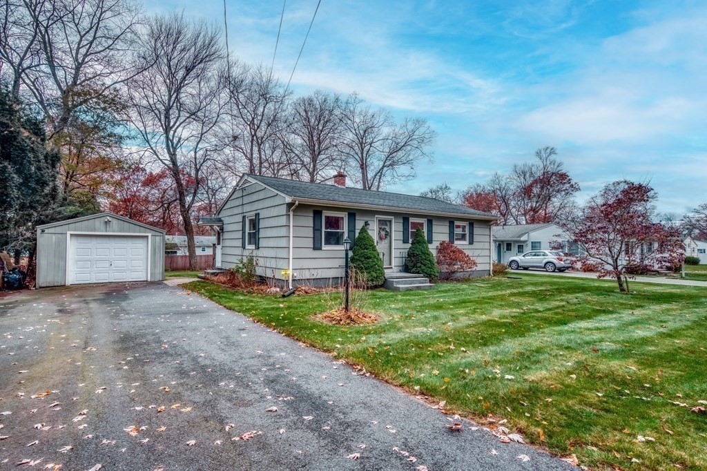 150 Louis Road Springfield, MA 01118 - Photo 6 of 39 a view of house with outdoor space and garden