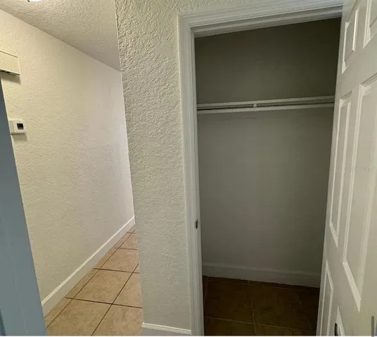 a bathroom with a glass door