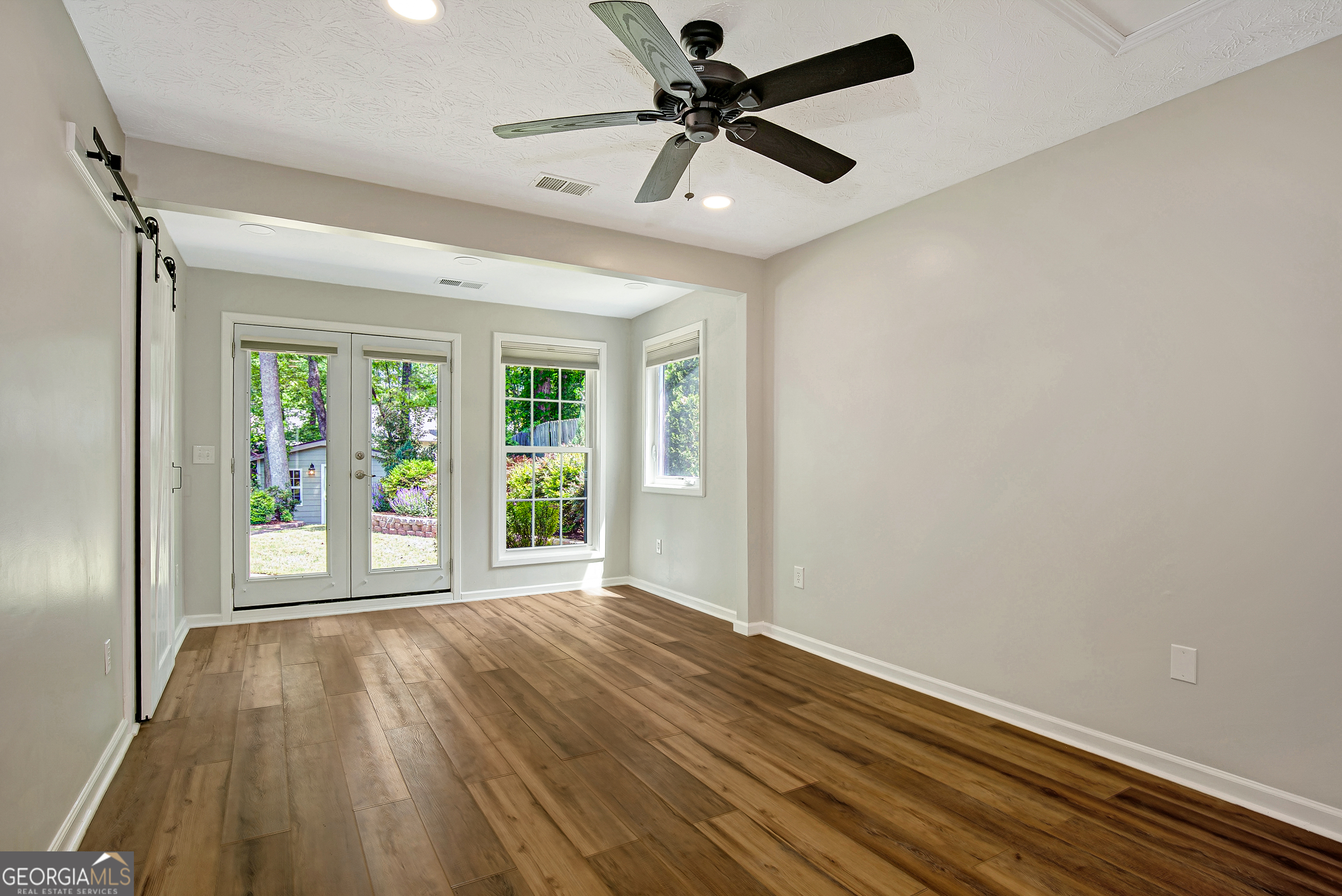 128 Lake Cove Approach Newnan, GA 30265 - Photo 25 of 63 a view of an empty room with a window