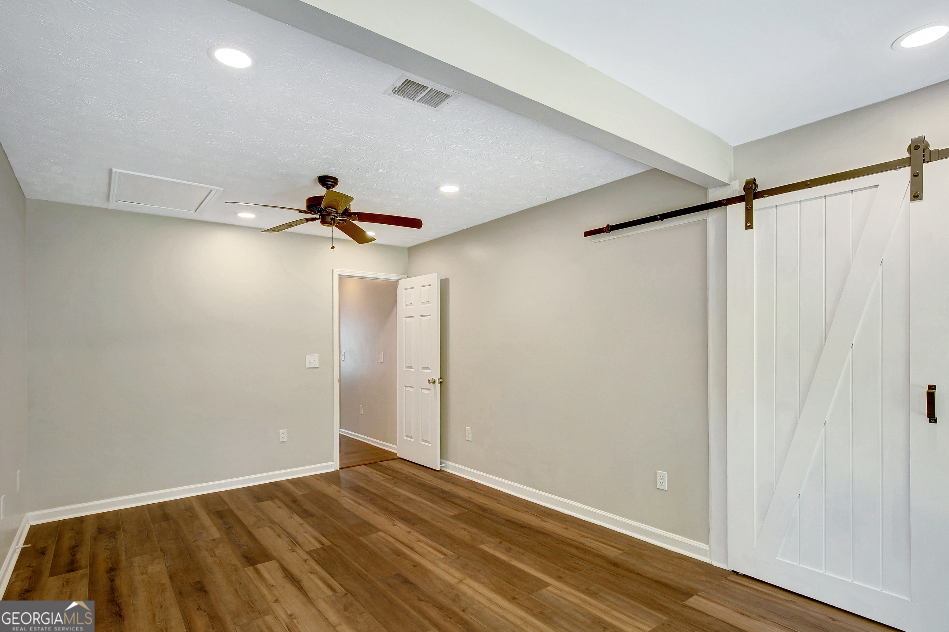 128 Lake Cove Approach Newnan, GA 30265 - Photo 27 of 63 a view of a room with wooden floor