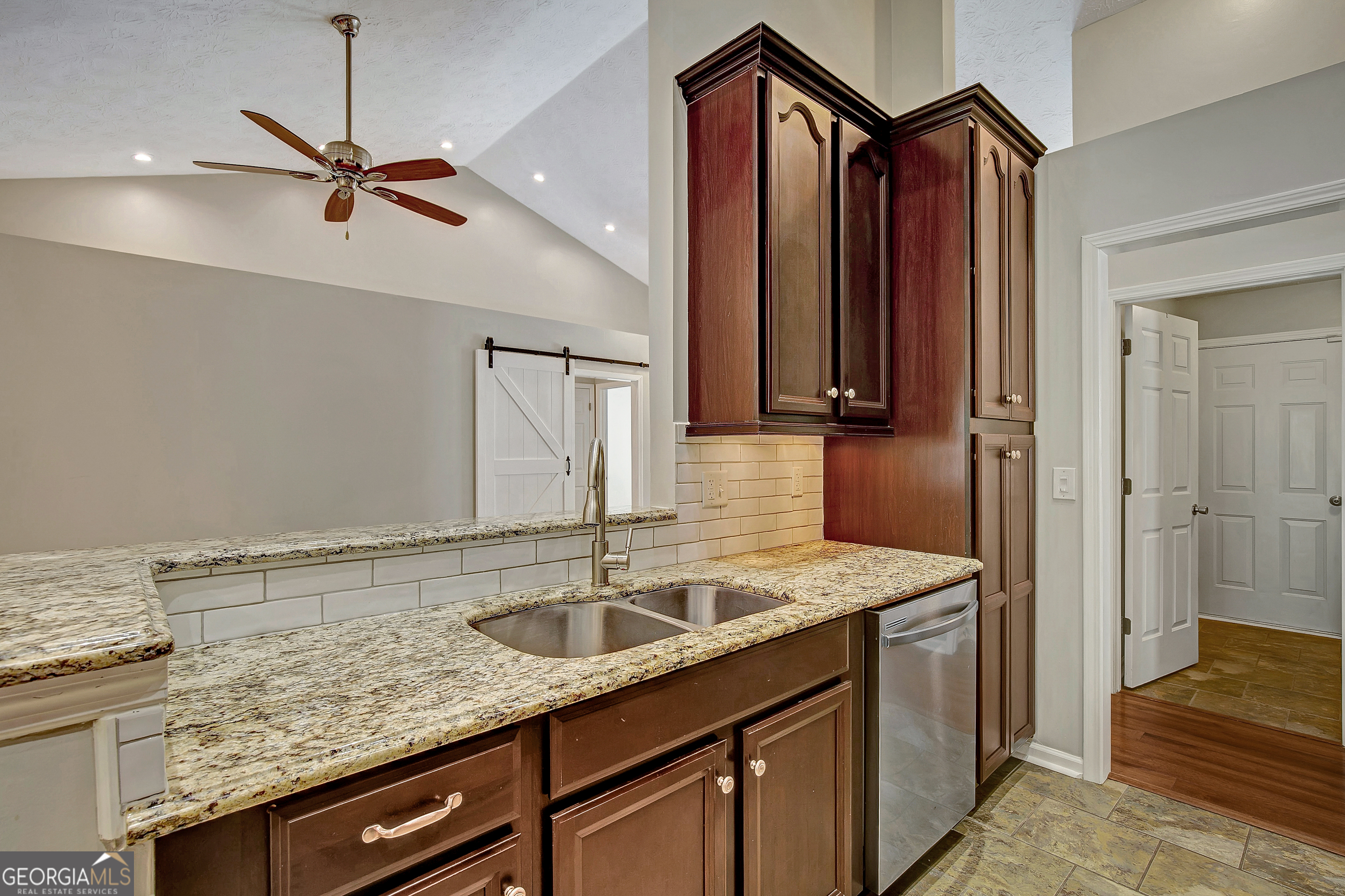 128 Lake Cove Approach Newnan, GA 30265 - Photo 34 of 63 a bathroom with a sink and a mirror