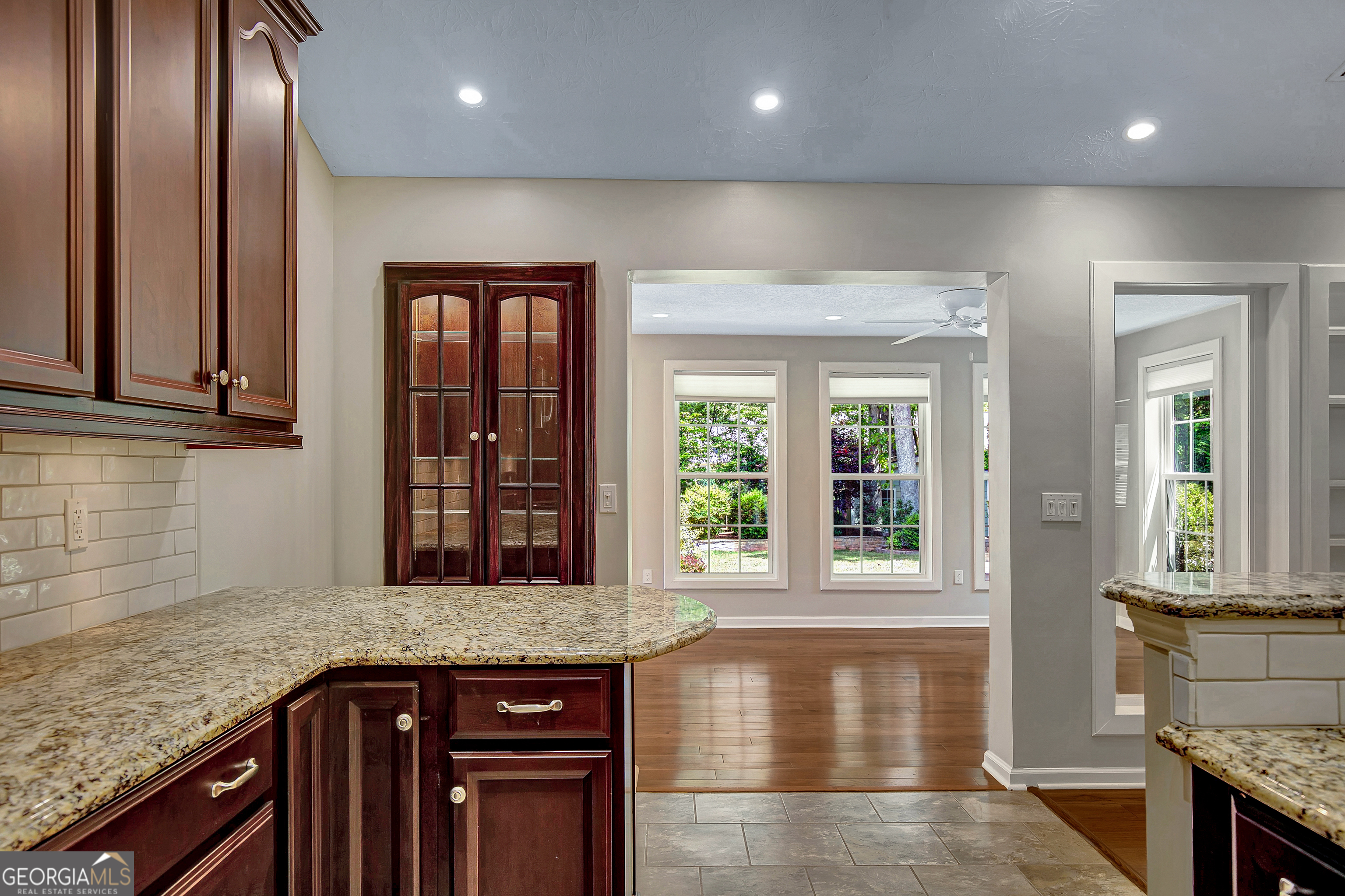 128 Lake Cove Approach Newnan, GA 30265 - Photo 44 of 63 a kitchen with a sink and large window