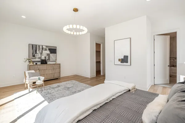 a bedroom with a bed and furniture