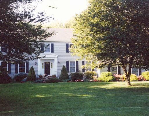 58 Trails End Road Weston, CT 06883 - Photo 1 of 1 a view of a house with a big yard potted plants and large tree